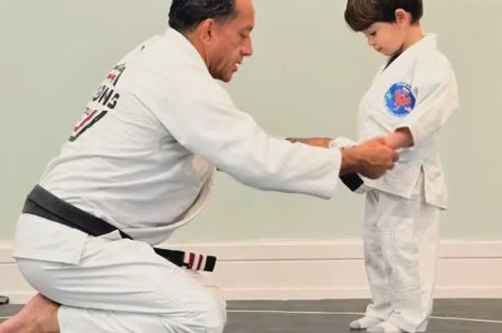 Kids learning sportsmanship through martial arts